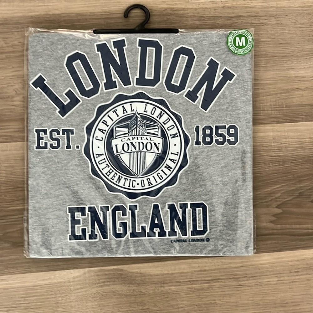 New in package London shirt. Size Medium